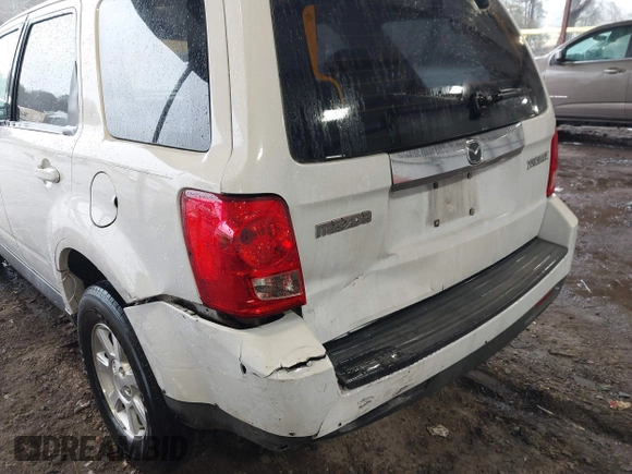 2008 Mazda Tribute ES with VIN 4F2CZ06148KM13459, listed as a IAAI auction lot 41742402 with 196,030 mi miles and . Bid and sale history available at DreamBid. Image 6.