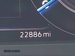2023 Volkswagen Atlas SEL z VIN 1V2BR2CA9PC534703, wystawiony jako IAAI lot #42033612 z przebiegiem 22 886 mil mil oraz . Historia ofert i sprzedaży dostępna na DreamBid. Obrazek 16.