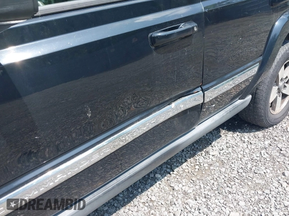 2006 Jeep Commander with VIN 1J8HG48K56C324296, listed as a IAAI auction lot 42735532 with 143,009 mi miles and . Bid and sale history available at DreamBid. Image 6.