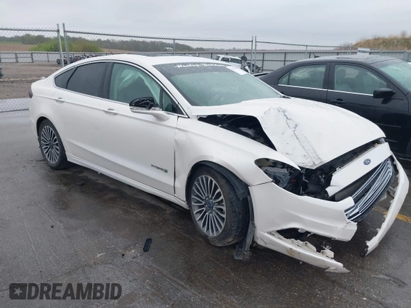 2017 Ford Fusion Hybrid Titanium с VIN 3FA6P0RUXHR317572, выставлен на аукционе IAAI как лот 42170169 с пробегом 138 987 миль миль и . История ставок и продаж доступна на DreamBid. Изображение 1.
