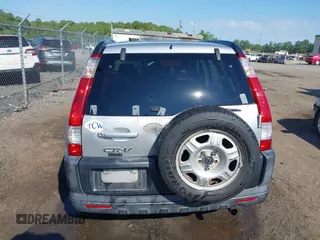 2006 Honda CR-V LX z VIN SHSRD78596U445523, wystawiony jako IAAI lot #42212230 z przebiegiem 141 228 mil mil oraz . Historia ofert i sprzedaży dostępna na DreamBid. Obrazek 17.