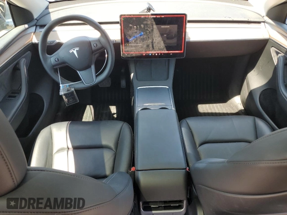 2024 Tesla Model Y z VIN 7SAYGDED9RF005104, wystawiony jako Copart lot #64974545 z przebiegiem 20 422 mil mil oraz Szkoda całkowita • Salvage title. Historia ofert i sprzedaży dostępna na DreamBid. Obrazek 8.