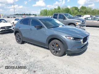 2024 Mazda CX-30 S Preferred with VIN 3MVDMBCM5RM632002, listed as a IAAI auction lot 42029562 with 12,963 mi miles and . Bid and sale history available at DreamBid. Image 1.