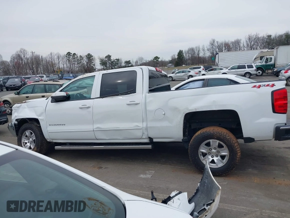 2018 Chevrolet Silverado 1500 LT with VIN 1GCUKREC0JF208509, listed as a IAAI auction lot 41794616 with 96,962 mi miles and . Bid and sale history available at DreamBid. Image 15.