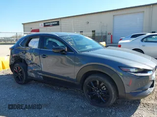 2023 Mazda CX-30 2.5 S Carbon Edition with VIN 3MVDMBCM5PM528946, listed as a IAAI auction lot 41882936 with 62,815 mi miles. Bid and sale history available at carsss.com. Image 6.