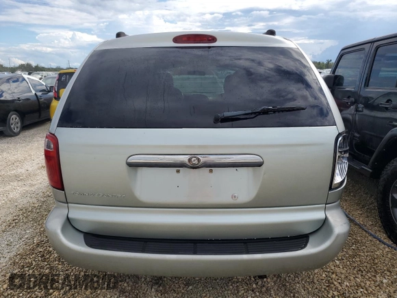2004 Chrysler Town & Country with VIN 1C8GP45R54B549047, listed as a Copart auction lot 74229214 with 124,566 mi miles and Non Repairable. Bid and sale history available at DreamBid. Image 6.
