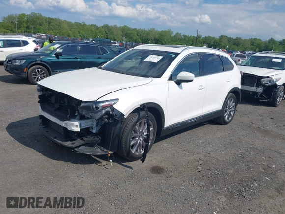 2021 Mazda CX-9 Grand Touring with VIN JM3TCBDY2M0541290, listed as a IAAI auction lot 42216643 with 38,661 mi miles and . Bid and sale history available at DreamBid. Image 17.