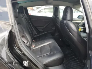 2021 Tesla Model 3 Standard Range Plus with VIN 5YJ3E1EA7MF053663, listed as a Copart auction lot 51982265 with 90,529 mi miles and Salvage Title. Bid and sale history available at DreamBid. Image 10.