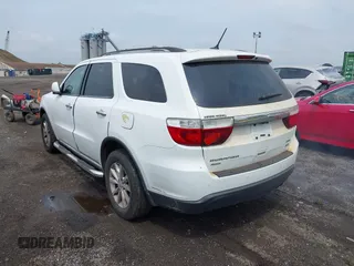 2013 Dodge Durango Crew with VIN 1C4RDJDG9DC667338, listed as a IAAI auction lot 42639559 with 137,020 mi miles and . Bid and sale history available at DreamBid. Image 3.