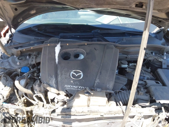 2018 Mazda CX-5 Touring z VIN JM3KFACM3J1339074, wystawiony jako IAAI lot #42317039 z przebiegiem 82 799 mil mil oraz . Historia ofert i sprzedaży dostępna na DreamBid. Obrazek 10.