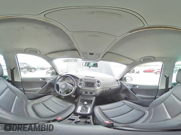 2012 Volkswagen Tiguan SE z VIN WVGAV7AXXCW531875, wystawiony jako Copart lot #82137824 z przebiegiem 147 210 mil mil oraz Tytuł czysty. Historia ofert i sprzedaży dostępna na DreamBid. Obrazek 13.