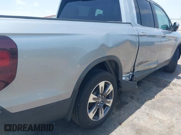 2018 Honda Ridgeline RTL z VIN 5FPYK2F5XJB001064, wystawiony jako IAAI lot #42252956 z przebiegiem 95 272 mil mil oraz . Historia ofert i sprzedaży dostępna na DreamBid. Obrazek 18.