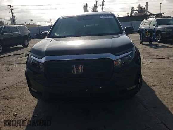 2023 Honda Ridgeline RTL with VIN 5FPYK3F52PB023574, listed as a Copart auction lot 44419565 with 15,205 mi miles and Salvage title. Bid and sale history available at DreamBid. Image 11.