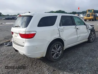 2013 Dodge Durango R/T with VIN 1C4SDHCT4DC648639, listed as a IAAI auction lot 42504044 with 193,909 mi miles and . Bid and sale history available at DreamBid. Image 4.