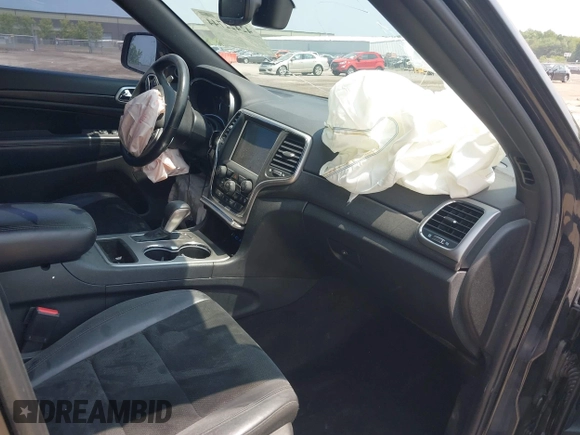 2017 Jeep Grand Cherokee Laredo with VIN 1C4RJFAGXHC818834, listed as a IAAI auction lot 42422744 with 154,287 mi miles and . Bid and sale history available at DreamBid. Image 5.
