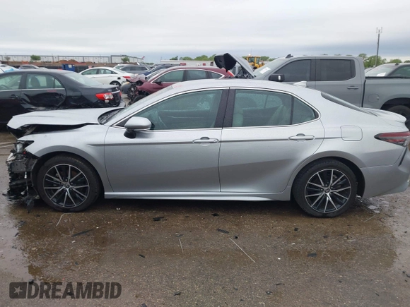 2022 Toyota Camry SE with VIN 4T1G11AKXNU697576, listed as a IAAI auction lot 41947082 with 67,199 mi miles and . Bid and sale history available at DreamBid. Image 14.