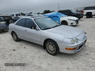 2001 Acura Integra LS z VIN JH4DB76571S000122, wystawiony jako Copart lot #68906974 z przebiegiem 162 045 mil mil oraz Czysty tytuł • Clean title. Historia ofert i sprzedaży dostępna na DreamBid. Obrazek 4.