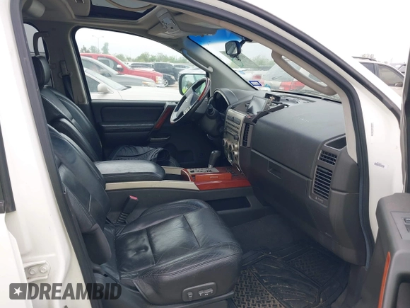 2005 Infiniti QX56 with VIN 5N3AA08A65N802774, listed as a IAAI auction lot 41899540 with 229,216 mi miles. Bid and sale history available at carsss.com. Image 5.