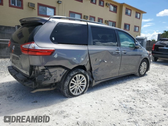 2015 Toyota Sienna XLE with VIN 5TDYK3DCXFS668851, listed as a Copart auction lot 60452005 with 205,549 mi miles and Salvage title. Bid and sale history available at DreamBid. Image 3.