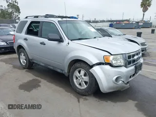 2012 Ford Escape XLT with VIN 1FMCU9D74CKB79211, listed as a IAAI auction lot 42464491 with 144,757 mi miles and . Bid and sale history available at DreamBid. Image 1.