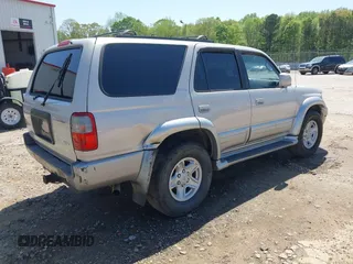 2000 Toyota 4Runner Limited with VIN JT3GN87R1Y0164022, listed as a IAAI auction lot 41990999 with 337,094 mi miles and . Bid and sale history available at DreamBid. Image 4.