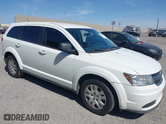2014 Dodge Journey SE with VIN 3C4PDCAB4ET193896, listed as a IAAI auction lot 42126565 with 242,108 mi miles and . Bid and sale history available at carsss.com. Image 1.