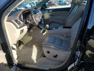 2017 Jeep Grand Cherokee Overland z VIN 1C4RJFCG9HC663433, wystawiony jako Copart lot #49231665 z przebiegiem 171 721 mil mil oraz Szkoda całkowita • Salvage title. Historia ofert i sprzedaży dostępna na DreamBid. Obrazek 7.