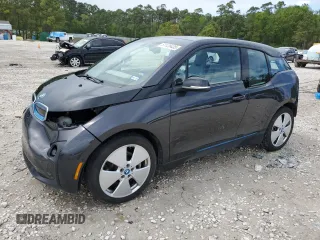 2015 BMW i3 z VIN WBY1Z2C57FV555583, wystawiony jako Copart lot #51128435 z przebiegiem 49 492 mil mil oraz Szkody całkowita. Historia ofert i sprzedaży dostępna na DreamBid. Obrazek 1.