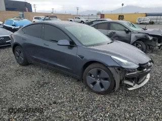 2022 Tesla Model 3 Long Range with VIN 5YJ3E1EB1NF112040, listed as a Copart auction lot 48695485 with 51,683 mi miles and Salvage Title. Bid and sale history available at DreamBid. Image 4.