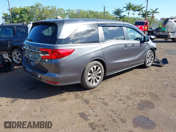 2023 Honda Odyssey EX-L with VIN 5FNRL6H65PB002896, listed as a IAAI auction lot 41559502 with 82,390 mi miles. Bid and sale history available at carsss.com. Image 4.