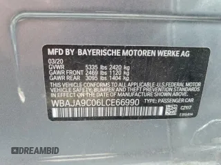 2020 BMW 5 Series 530e with VIN WBAJA9C06LCE66990, listed as a Copart auction lot 48823925 with 57,673 mi miles and Salvage Title. Bid and sale history available at DreamBid. Image 12.