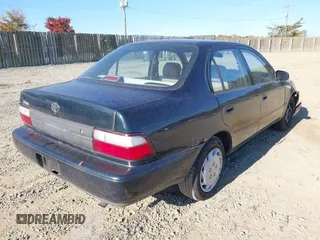 1997 Toyota Corolla with VIN 2T1BA02E0VC162383, listed as a IAAI auction lot 40715985 with 141,713 mi miles and . Bid and sale history available at DreamBid. Image 4.
