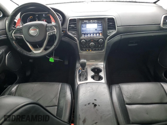 2017 Jeep Grand Cherokee Summit with VIN 1C4RJFJT1HC818136, listed as a Copart auction lot 81057084 with 135,843 mi miles and Salvage title. Bid and sale history available at DreamBid. Image 8.