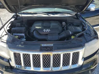 2013 Jeep Grand Cherokee Overland with VIN 1C4RJECG5DC595989, listed as a Copart auction lot 73385354 with 157,876 mi miles and Clean Title. Bid and sale history available at carsss.com. Image 12.