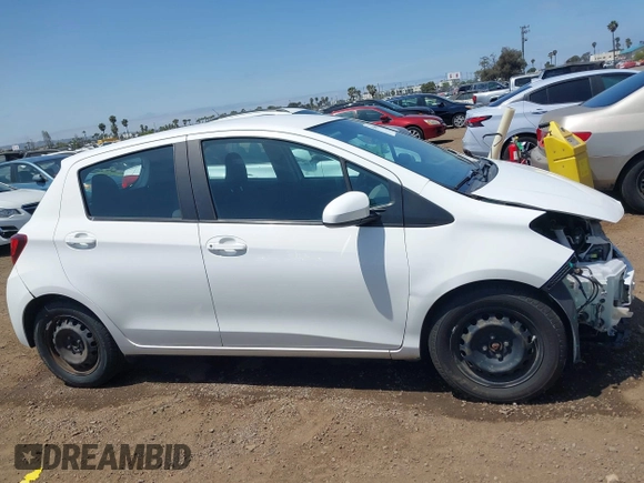 2015 Toyota Yaris L with VIN VNKKTUD37FA041957, listed as a IAAI auction lot 42106508 with 104,496 mi miles and . Bid and sale history available at DreamBid. Image 14.