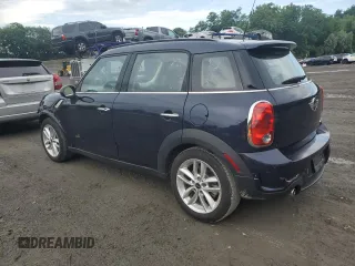2013 MINI Countryman S ALL4 with VIN WMWZC5C56DWP30689, listed as a Copart auction lot 59680895 with 80,766 mi miles and Salvage title. Bid and sale history available at DreamBid. Image 2.