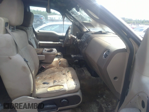 2004 Ford F-150 STX with VIN 1FTRX12W24FA21705, listed as a IAAI auction lot 39321035 with Not Provided miles and . Bid and sale history available at DreamBid. Image 5.