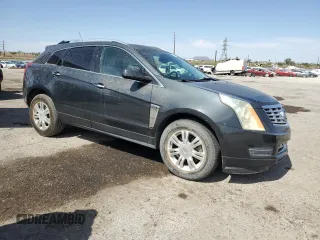 2015 Cadillac SRX Luxury Collection z VIN 3GYFNBE34FS541817, wystawiony jako Copart lot #58386685 z przebiegiem 51 731 mil mil oraz Szkoda całkowita • Salvage title. Historia ofert i sprzedaży dostępna na DreamBid. Obrazek 4.
