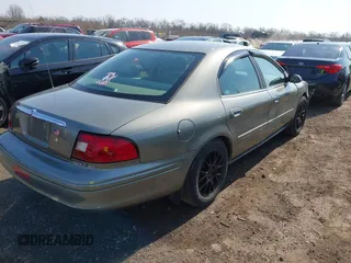 2003 Mercury Sable GS z VIN 1MEFM50243A619761, wystawiony jako IAAI lot #41790150 z przebiegiem 114 522 mil mil oraz . Historia ofert i sprzedaży dostępna na DreamBid. Obrazek 4.