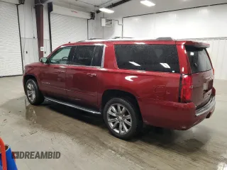 2019 Chevrolet Suburban Premier with VIN 1GNSKJKC6KR293389, listed as a Copart auction lot 77700264 with 49,057 mi miles and Salvage Title. Bid and sale history available at DreamBid. Image 2.
