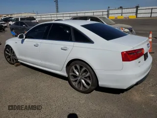 2015 Audi A6 Prestige with VIN WAUHGAFC7FN030286, listed as a Copart auction lot 71237874 with 74,334 mi miles and Salvage title. Bid and sale history available at DreamBid. Image 2.