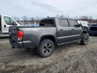 2016 Toyota Tacoma SR with VIN 3TMCZ5ANXGM042547, listed as a Copart auction lot 52010905 with 105,546 mi miles and Salvage Title. Bid and sale history available at carsss.com. Image 3.