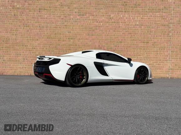 2016 McLaren 650S z VIN SBM11FAAXGW005605, wystawiony jako Copart lot #53181285 z przebiegiem 16 800 mil mil oraz Tytuł czysty. Historia ofert i sprzedaży dostępna na DreamBid. Obrazek 4.