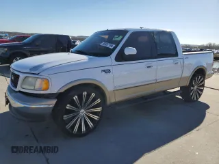 2001 Ford F-150 SuperCrew XLT with VIN 1FTRW07L11KE06364, listed as a Copart auction lot 85957154 with 0 mi miles and Salvage Title. Bid and sale history available at carsss.com. Image 1.