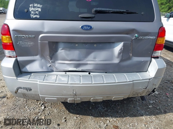 2007 Ford Escape Hybrid with VIN 1FMCU49H47KA90605, listed as a IAAI auction lot 42093591 with 136,924 mi miles and . Bid and sale history available at DreamBid. Image 6.