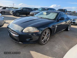 2007 Jaguar XK with VIN SAJWA43B075B09846, listed as a Copart auction lot 76014244 with 0 mi miles and Salvage Title. Bid and sale history available at carsss.com. Image 1.