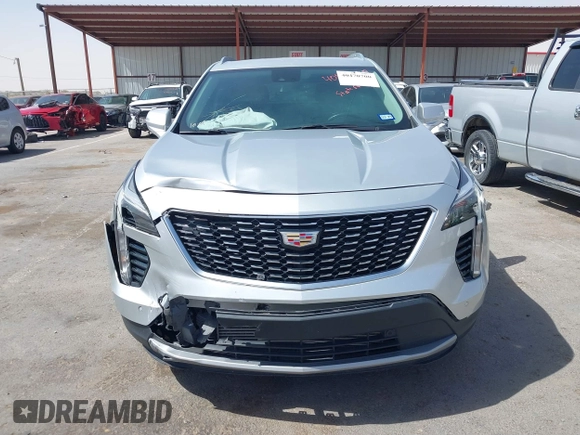 2021 Cadillac XT4 FWD Premium Luxury with VIN 1GYFZCR42MF005253, listed as a IAAI auction lot 40470700 with 70,571 mi miles and . Bid and sale history available at carsss.com. Image 12.