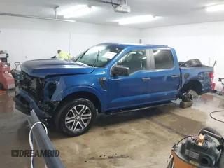 2023 Ford F-150 XL with VIN 1FTEW1EP8PKG08718, listed as a IAAI auction lot 41609293 with 26,414 mi miles. Bid and sale history available at carsss.com. Image 2.