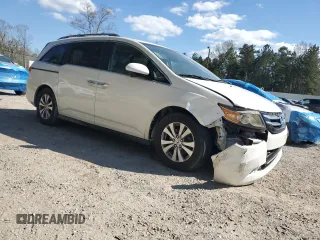 2016 Honda Odyssey EX-L with VIN 5FNRL5H69GB003379, listed as a Copart auction lot 48932295 with 144,904 mi miles and Salvage Title. Bid and sale history available at DreamBid. Image 4.