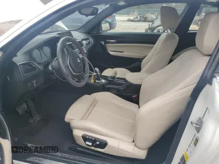 2018 BMW 2 Series 230i xDrive with VIN WBA2J3C52JVD48952, listed as a Copart auction lot 46394065 with 77,274 mi miles and Salvage title. Bid and sale history available at DreamBid. Image 7.